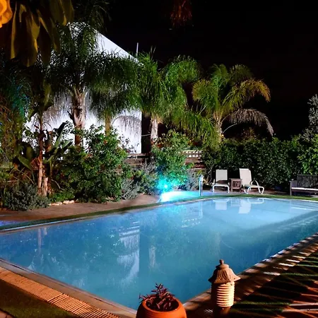 Thaliana Palm Retreat *