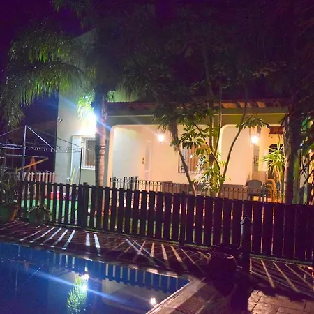 Thaliana Palm Retreat